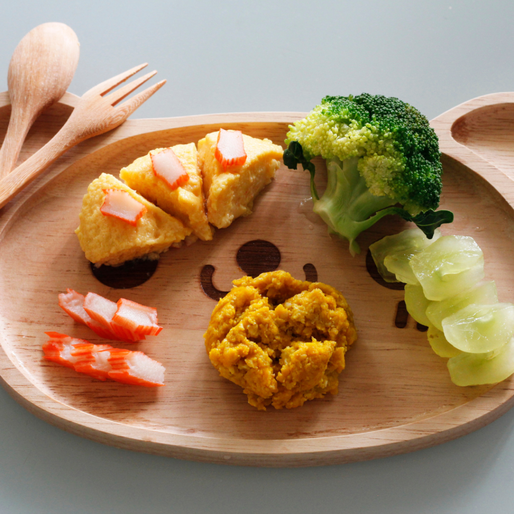 a wooden plate with food on it
